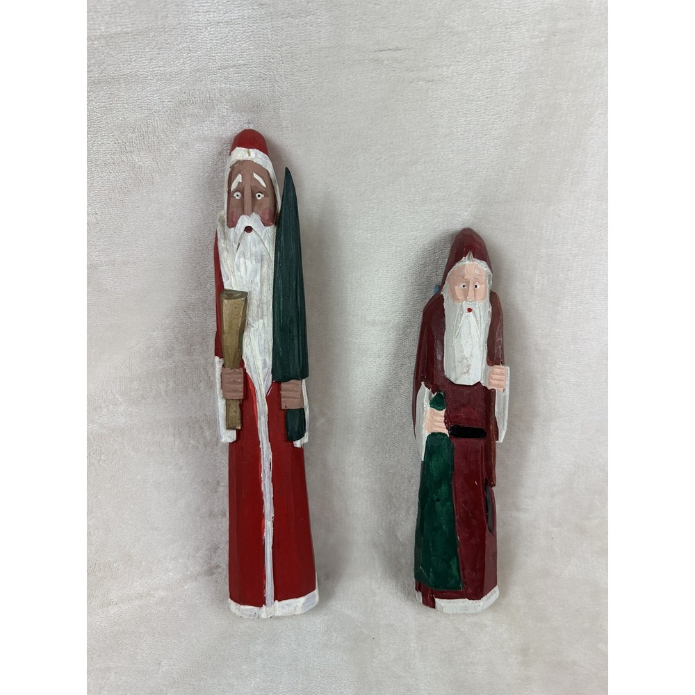 VINTAGE  FOLK ART HAND CARVED WOOD SANTAS HOLDING CHRISTMAS TREES 10" and 8"